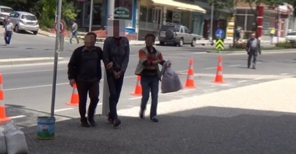 Çarşaflı hırsız yakalandı